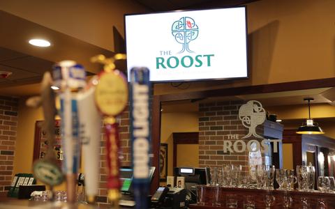 Close up of the tap beers at The Roost bar on campus