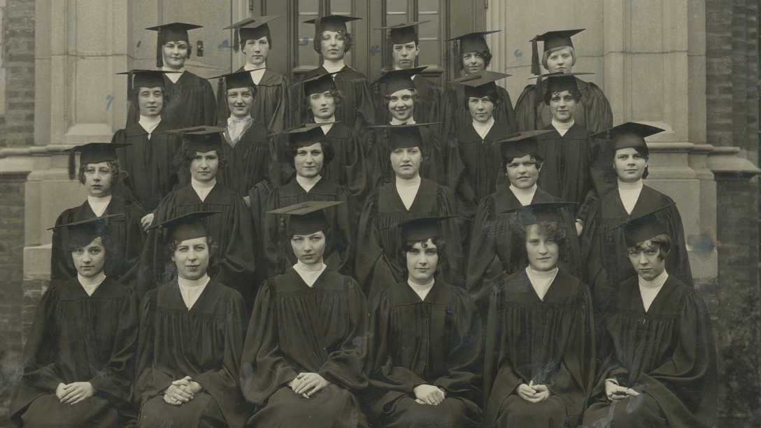 a group of mercyhurst graduates in caps and gowns - archive photo