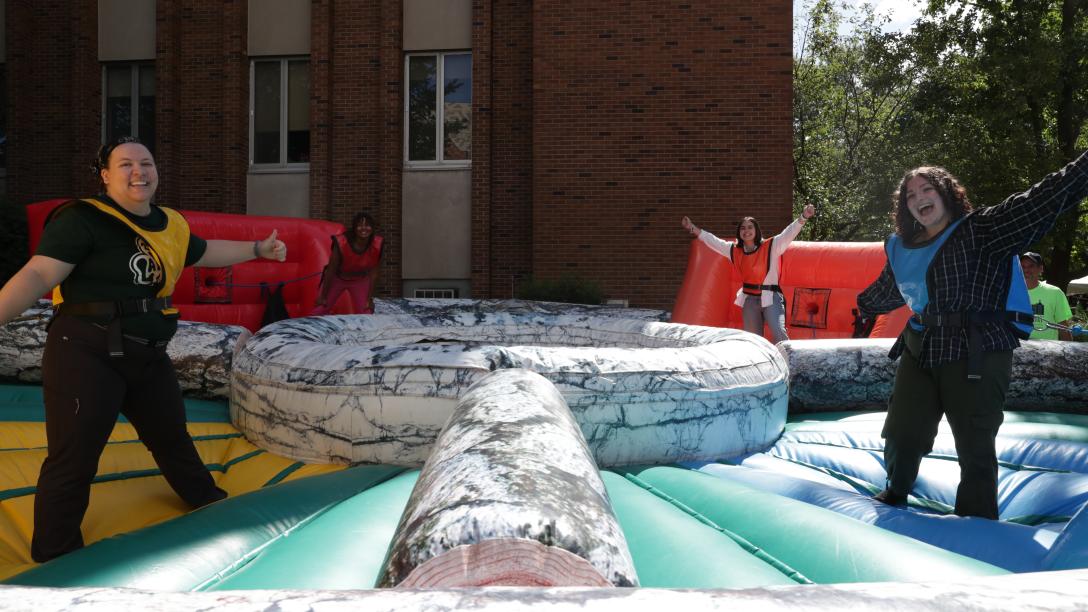 Students on inflatable game