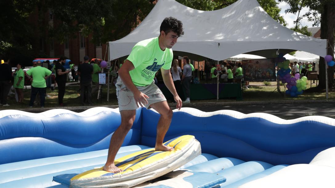 student on inflatable game